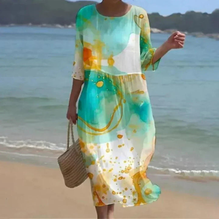 Marvella – Elegantní midi šaty s uměleckým potiskem
